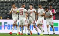 Iran players celebrate